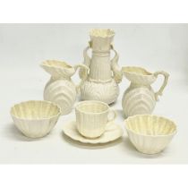 A collection of 2nd, 3rd and later Belleek pottery. A large 2nd period black stamp vase 13x23cm. 8