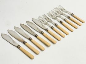 A 12 piece silver mounted cutlery set. Sheffield.