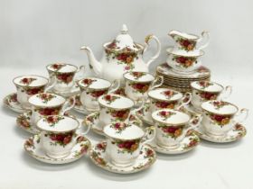 A 39 piece Royal Albert ‘Old Country Roses’ tea set. Teapot 25x15x20cm. 12 sandwich plates, 12 tea