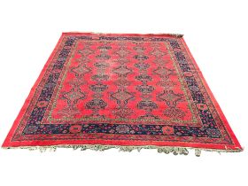 A very large Middle Eastern hand knotted rug. 367x467cm