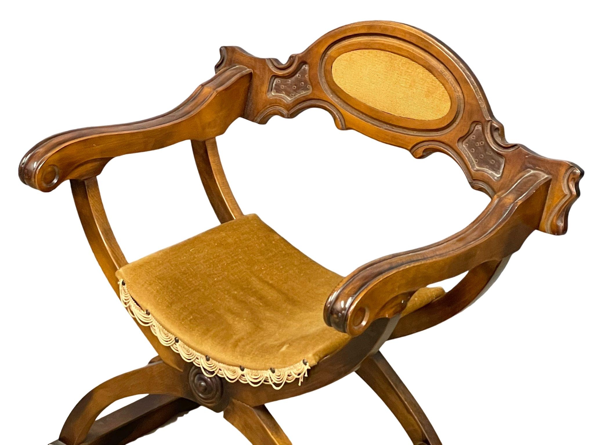 a 19th century style carved x-framed armchair. - Image 3 of 4