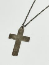 A silver cross necklace. 16.17 grams.