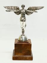 An early 20th century silver winged lady on stand. Titled ‘The Victory’ holding crown of laurels and