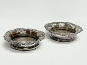A pair of large Victorian silver plated wine coasters. 19cm