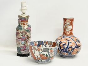 A collection of 19th century Japanese porcelain. A large mid 19th century Japanese Imari pattern