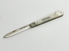 A silver and Mother of Pearl fruit knife. 12.5cm open.