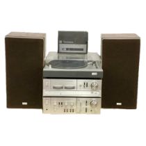 A vintage Toshiba music system. A Toshiba Direct Drive Turntable SR-255 with speakers and Toshiba