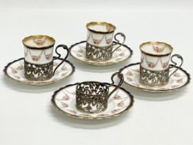 Early 20th century Aynsley porcelain coffee cans with silver mounts.