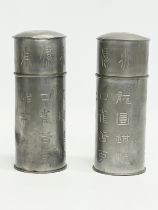 A pair of late 19th century Chinese pewter canisters. 16cm