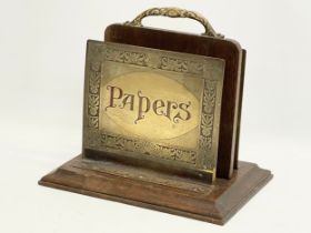 An early 20th century double sided brass and oak paper rack. 27x20.5x27cm