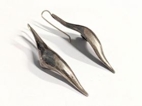 A pair of silver earrings