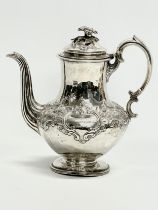 A 19th century silver coffee pot depicting William III. Stamped London, 1851. Henry Holland of