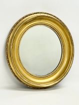 A Victorian gilt framed mirror. 46x51cm