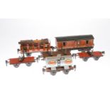 6 versch. Märklin Wagen, Spur 0, darunter 2 engl., LS und Alterungsspuren, Z 4