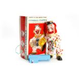 Y Japan Automat ”Cymbal Clown”, lachend und weinend, batteriebetrieben, mit Fernbedienung, H 26, OK,