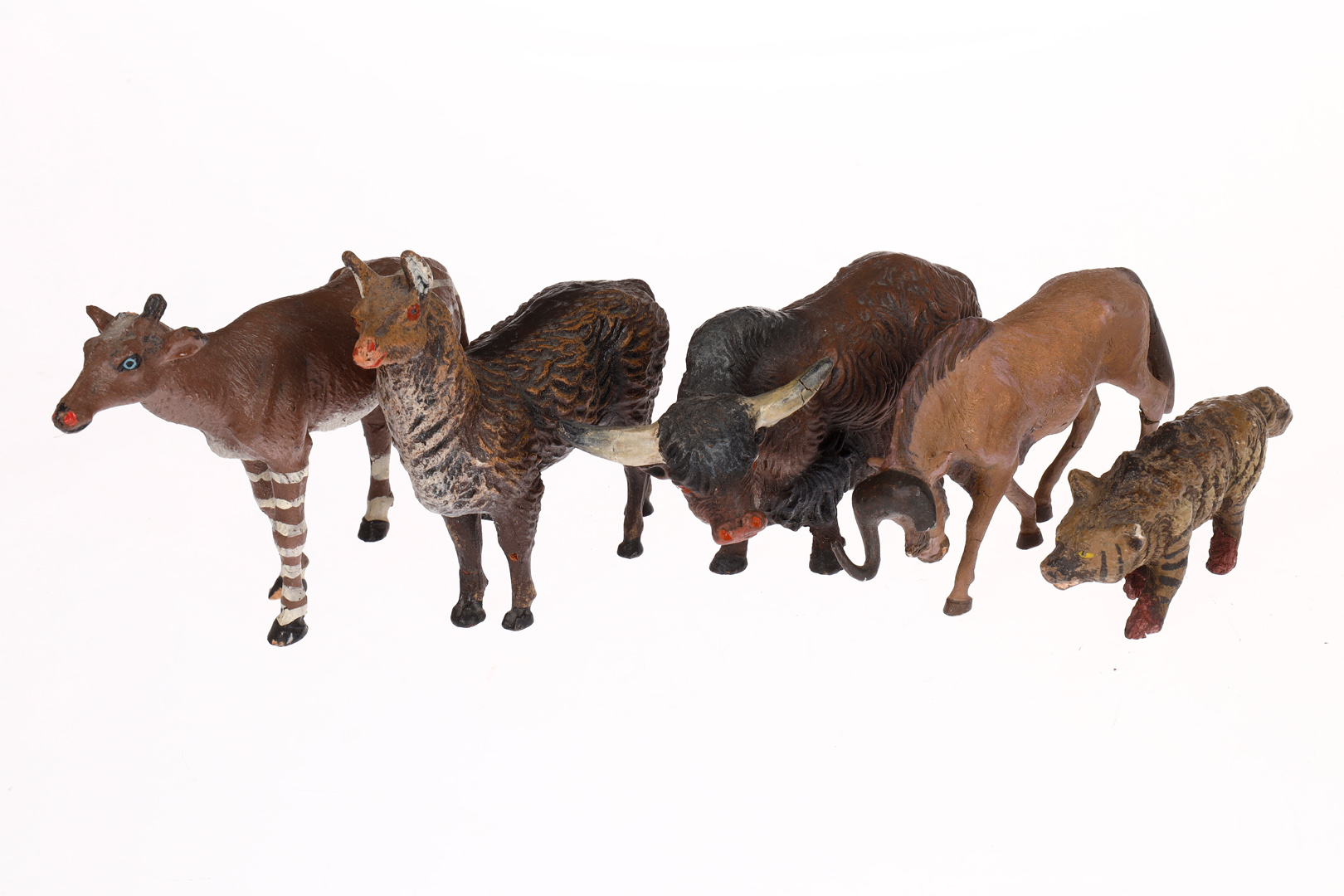 Konv. 5 Elastolin/Lineol u.a. Wildtiere, darunter Hyäne, Büffel und Okapi, Masse, HL, tw rissig