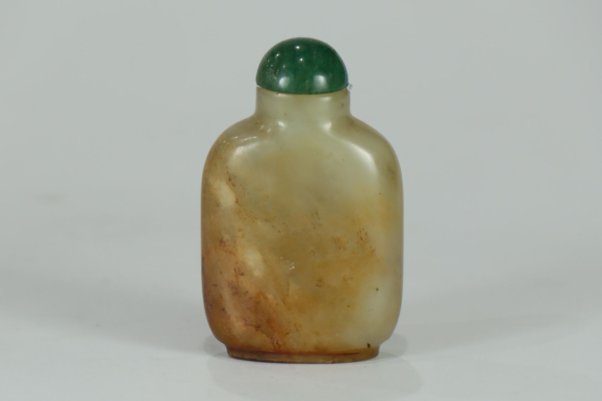 A 19th or 20th century jade snuff bottle