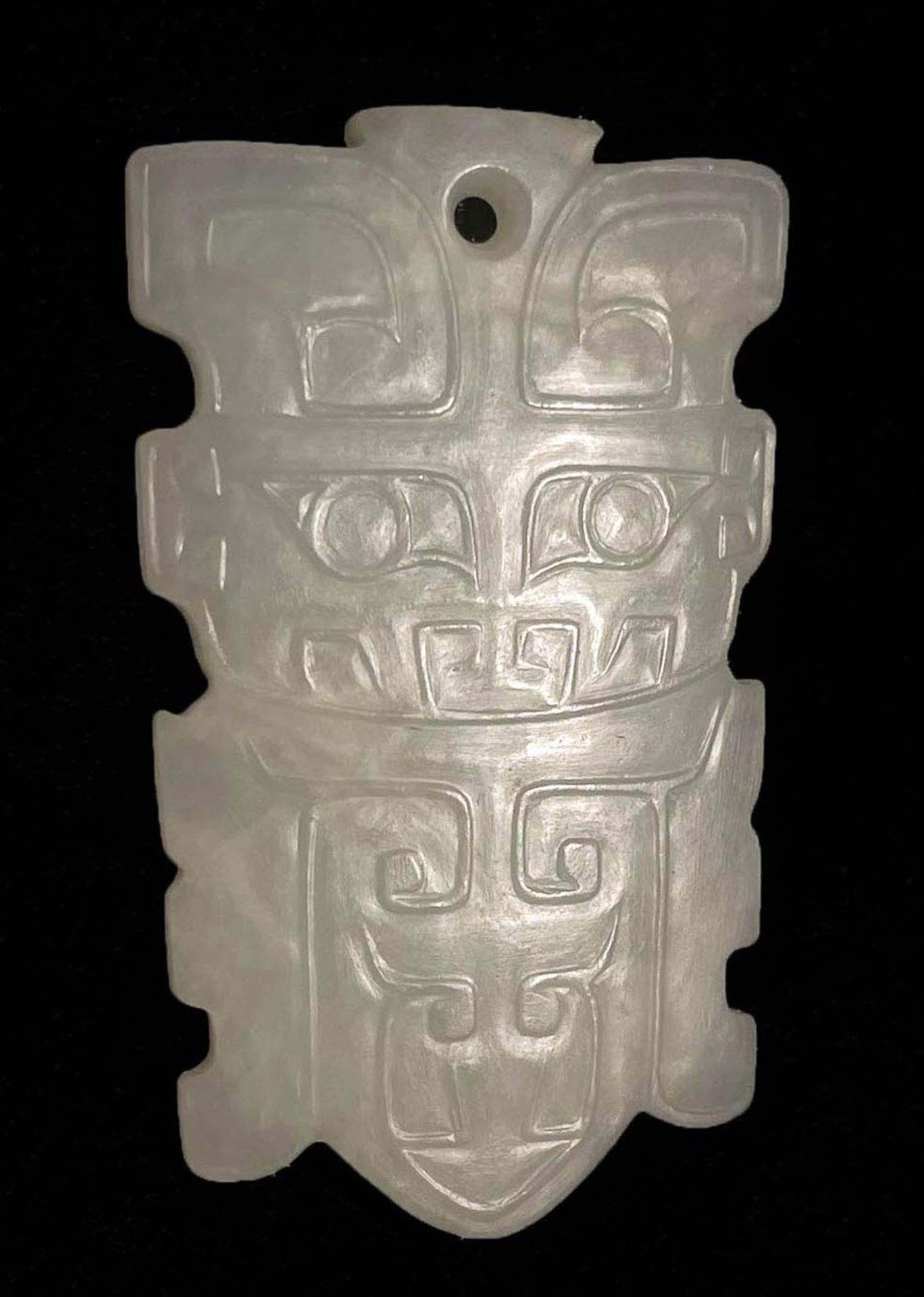 A jade-made Taotie pattern composite vessel