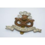 North Staffordshire cap badge.