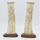 A pair of World War One (WW1) Isle of Man 1916 'Knockaloe' Prisoner of War carved bones mounted on