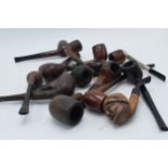 A collection of vintage smoking pipes and similar of varying forms to include makes such as