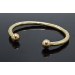 9ct gold torque bangle, 7.5 grams. Modern, hollow.