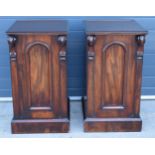 Victorian mahogany pair of bedside tables with scroll-like features, one with pull-out drawers