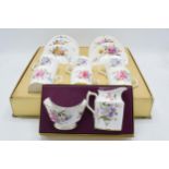 A Royal Crown Derby boxed Posies pattern coffee service, comprising of six cups and saucers, in