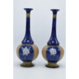 Royal Doulton Lambeth stoneware vases with low shoulder and onion shape body decorated with floral