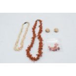 A collection of coral to include necklaces, a pair of earrings and loose coral beads, total weight