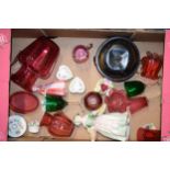 A collection of items to include cranberry glass, Doulton figure, antique metal spice drum with
