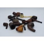A collection of vintage smoking pipes and similar of varying forms to include makes such as LHS,
