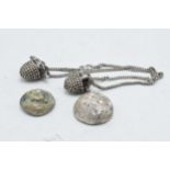 Rough silver ingots x 2 & ethnic jewellery together with a metal example. The two largest ingots and