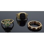 A trio of 9ct gold rings to include 2 ladies stone set rings (missing stones) and a gents onyx
