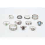A collection of 11 silver rings of varying forms and sizes, 42.2 grams (11).