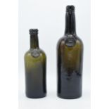 A pair of late 19th century glass bottles to include 'Inner Temple, 28.5cm tall together with Middle