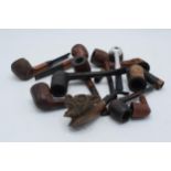 A collection of vintage smoking pipes and similar of varying forms to include makes such as Orlik,