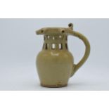 Early 19th century stoneware puzzle jug with pierced design in light glaze (unmarked), one section