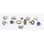 A collection of 12 silver rings of varying forms and sizes, 52.6 grams (12).