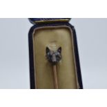 Diamond and ruby set fox head stick pin with 9ct gold pin, 6.5cm long.