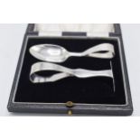 Cased silver christening set to include spoon and pusher, Birmingham 1930, 31.2 grams.
