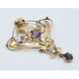 9ct gold amethyst set Art Nouveau pendant, 1.7 grams.