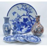 A collection of 19th century and later oriental pottery items to include a large Japanese blue and