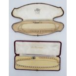 Two cased sets of imitation pearls with silver clasps, 1 in need of attention (2).