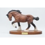 Beswick matte brown Spirit of Earth on wooden base (Doulton backstamp).