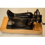 Singer hand-propelled sewing machine, circa 1940s.