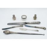 A collection of hallmarked silver items to include a pair of cruets, small fork, 46.7 grams of