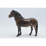 Beswick Exmoor pony (graze to right ear). In good condition with no obvious damage or restoration