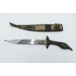 A mid to late 20th century Middle Eastern dagger / blade complete with sheath with mask head and