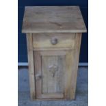 Wooden pine bedside cabinet / bathroom unit with carved motif to front, 69cm tall. Good condition, 4